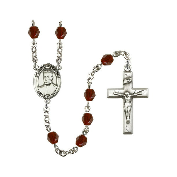 The charm features a Blessed Miguel Pro medal Patron Saint The Crucifix measures 5/8 x 1/4 Silver Plate Rosary Bracelet features 6mm Emerald Fire Polished beads 